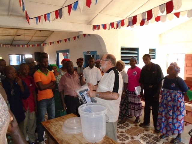 Teaching Liberians to use the filter to clean water
